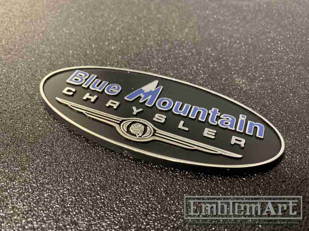 Custom Molded Plastic Emblems - Custom Blue Mountain Molded Plastic Chrome Foil Blue Pad Emblem